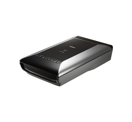 CANON CS9000F; CCD Scanner; 9600x9600 optical dpi; White LED Scanning; 48 bit; FARE Level 3 software; Film Left